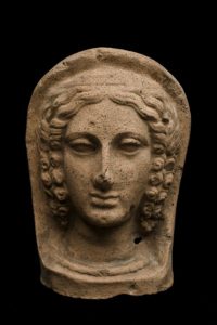 599px-Votive_female_head,_Roman,_200_BCE-100_CE_Wellcome_L0058446